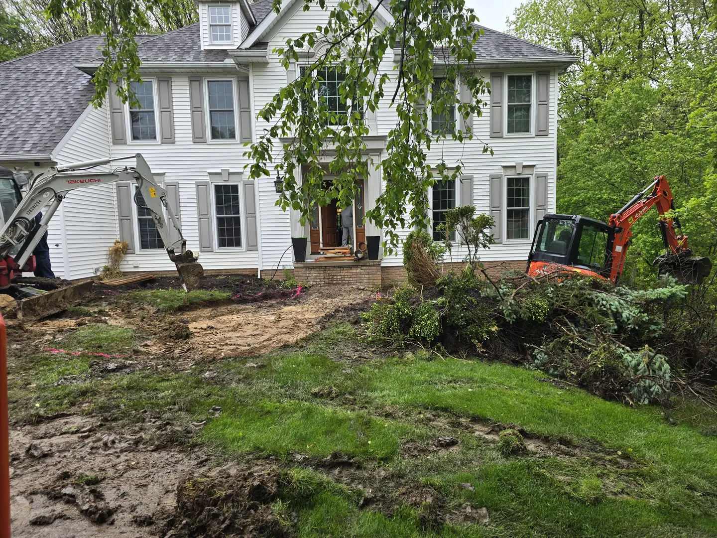 Driveway and front landscape construction in progress