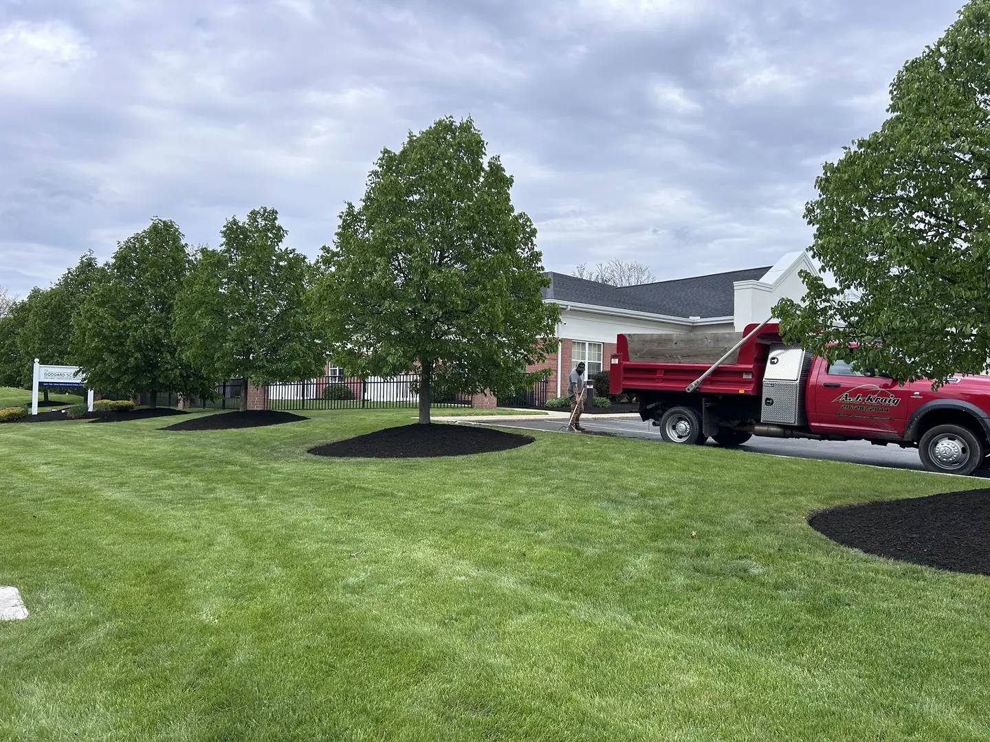 Finished residential landscape with fresh dark mulch