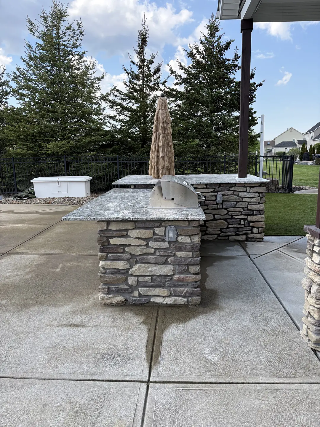 Stone outdoor kitchen and patio construction detail