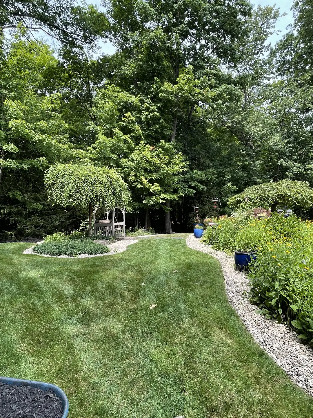Freshly edged and mulched residential landscape bed