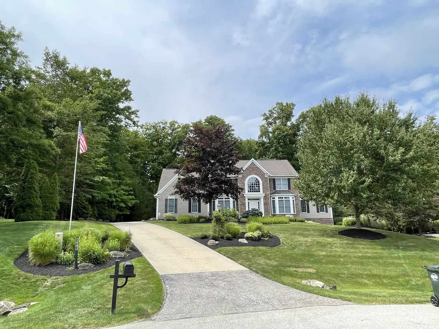 Freshly edged and mulched residential landscape bed