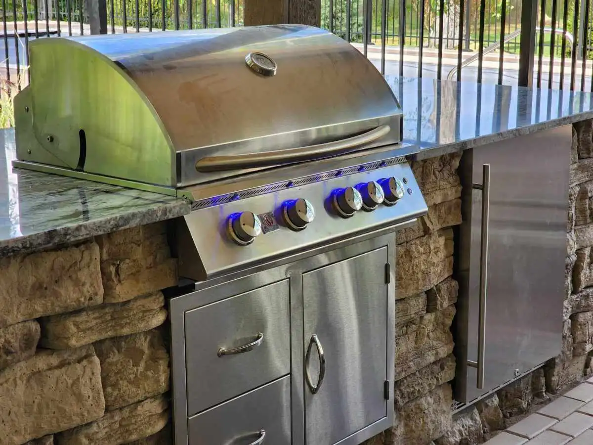 Outdoor grill with blue LED lighting