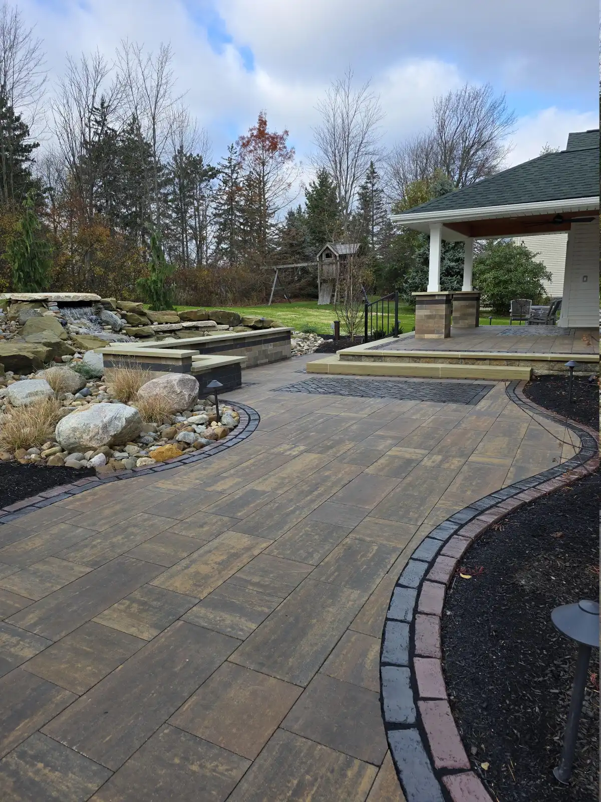 Custom paver patio with seating area installed by A.J. Kraig in Cleveland suburbs