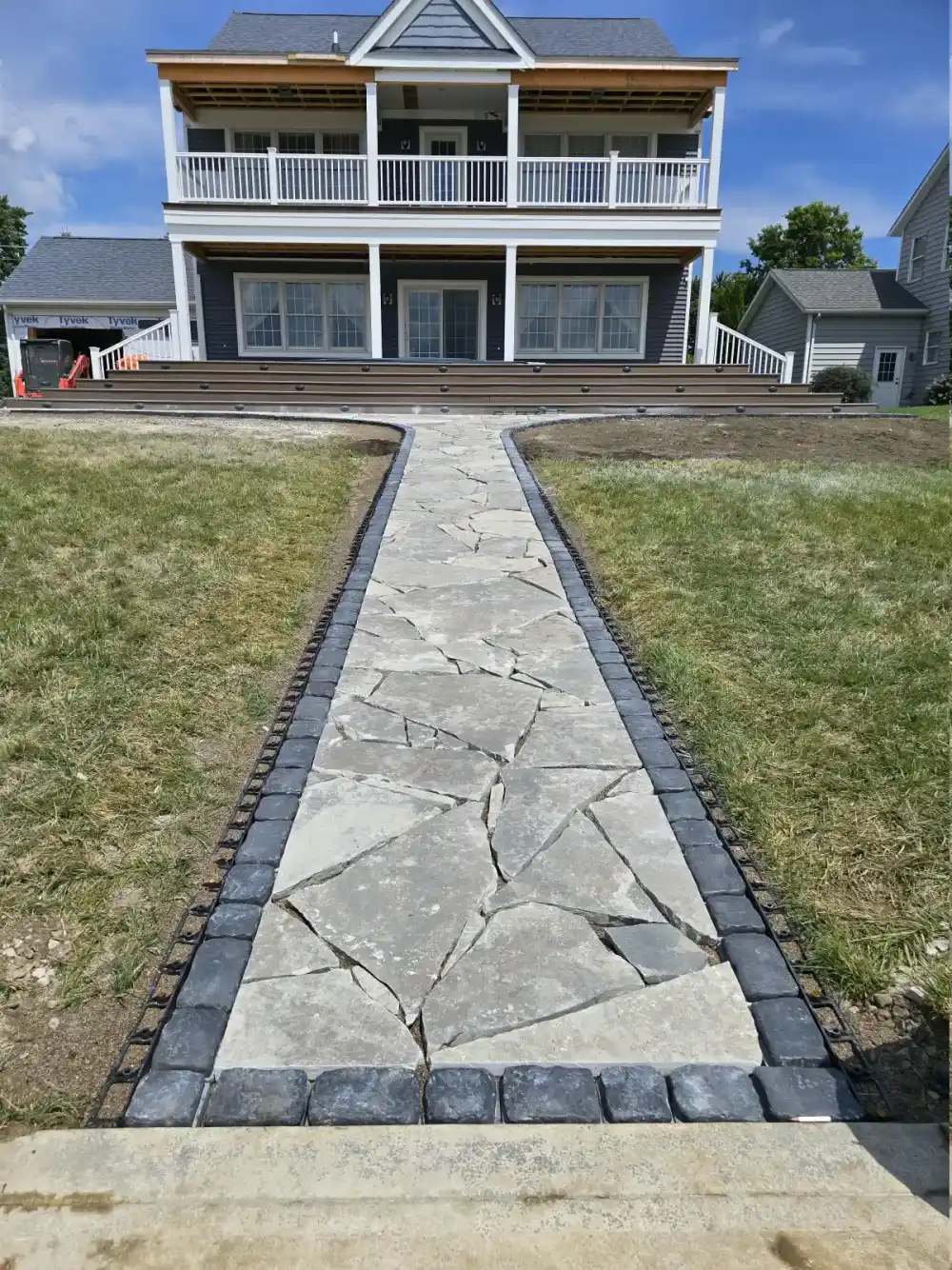 Natural stone walkway and pathway through a landscaped garden in North Royalton