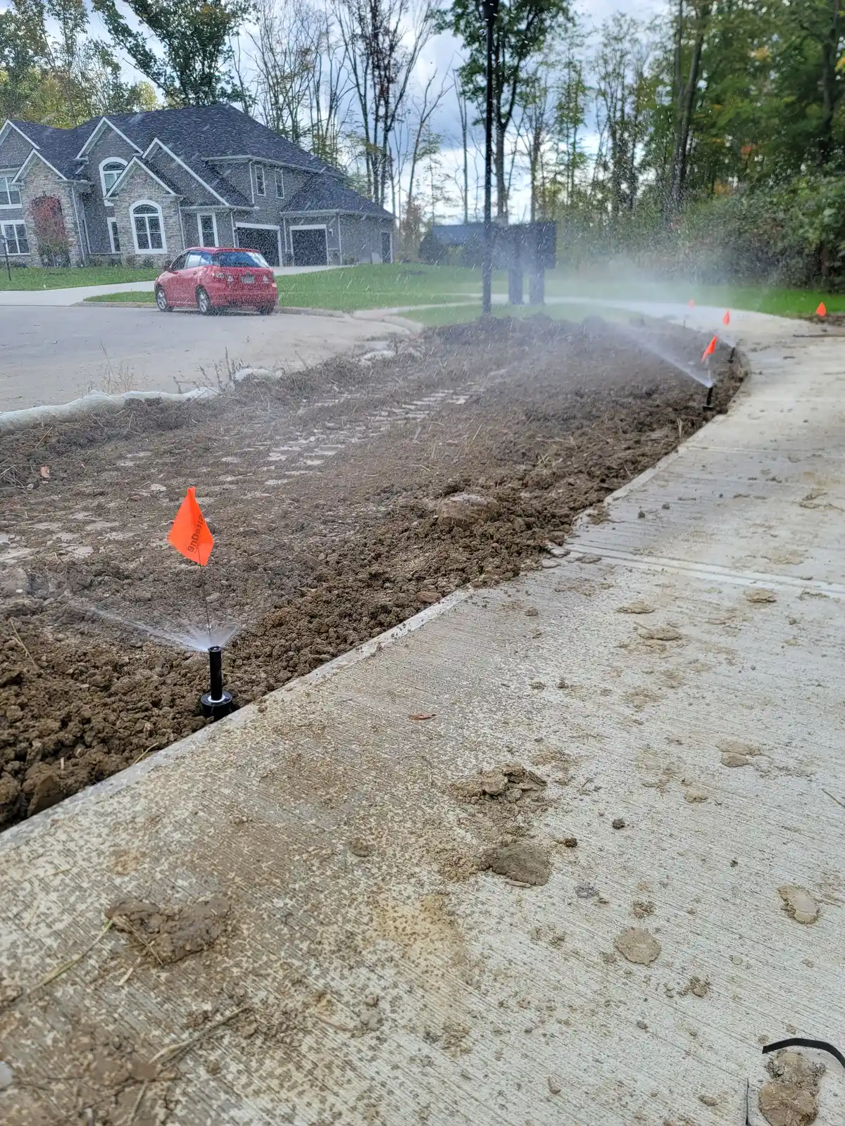 Drip line installation along landscape border