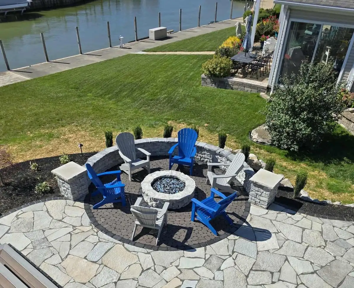Aerial view of completed lakefront patio and fire pit in Marblehead OH