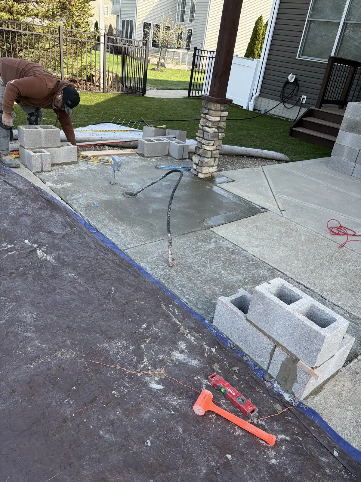 Stone outdoor kitchen and patio construction detail