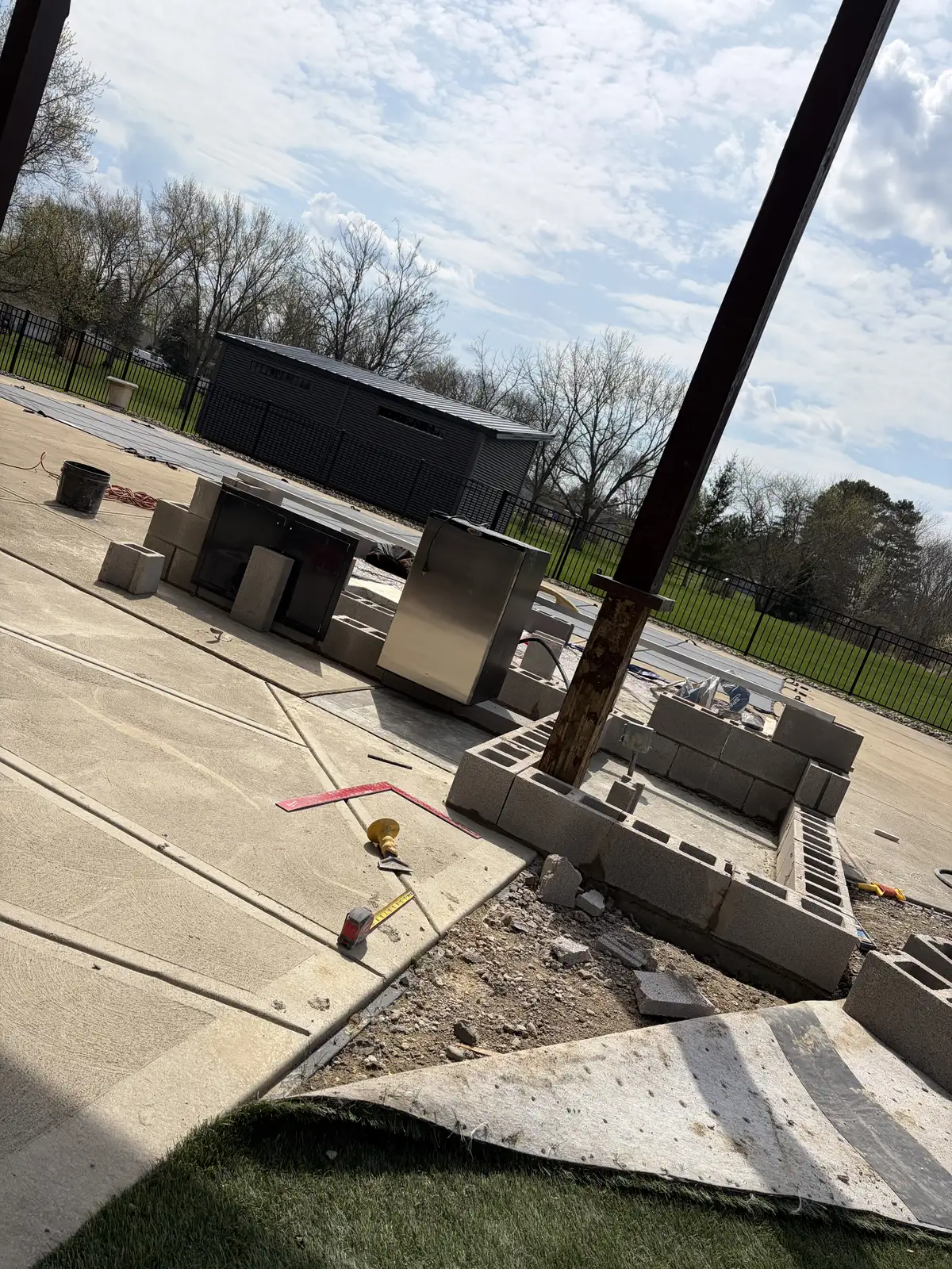 Stone outdoor kitchen and patio construction detail