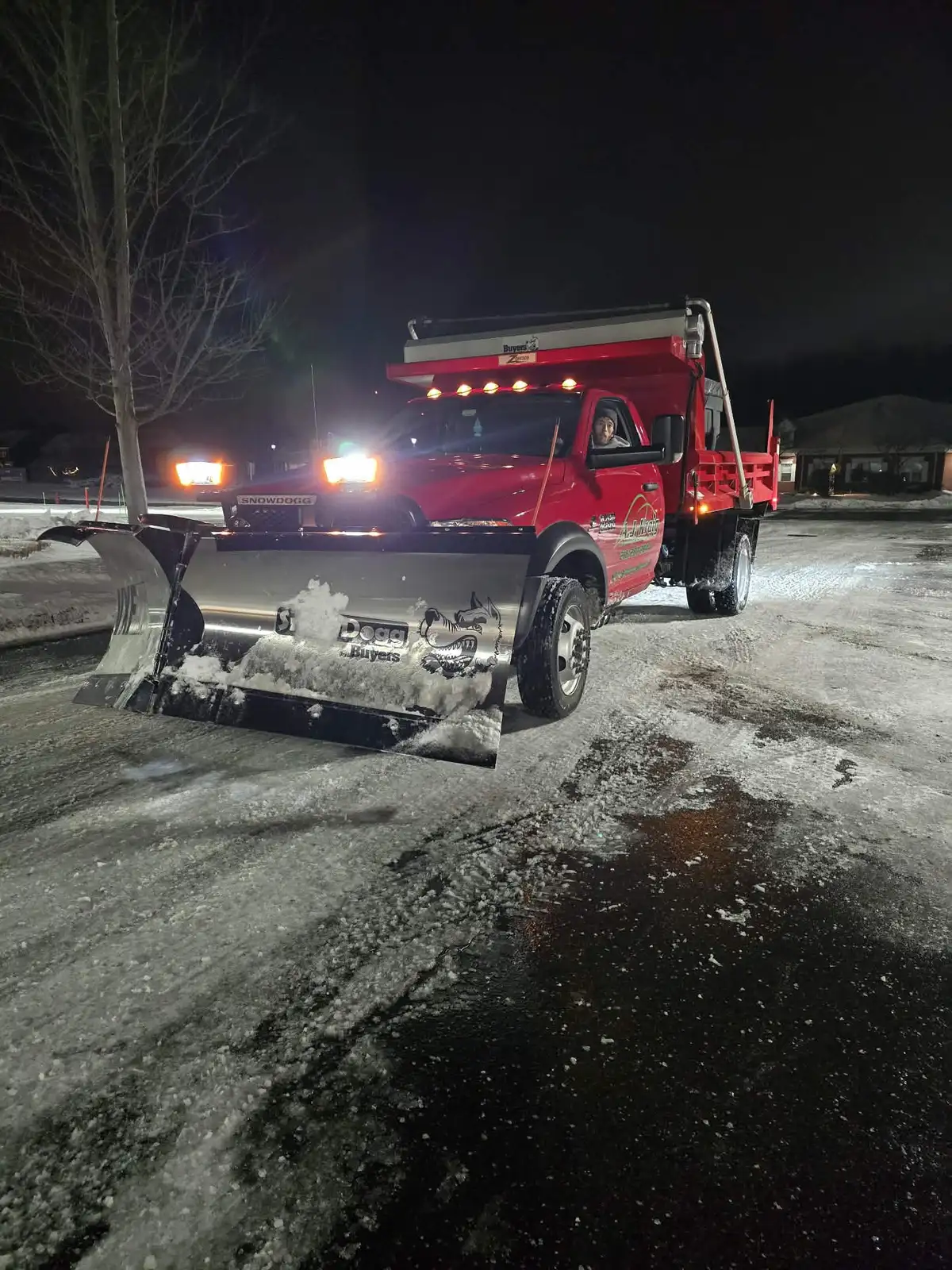 Residential snow plowing during winter storm