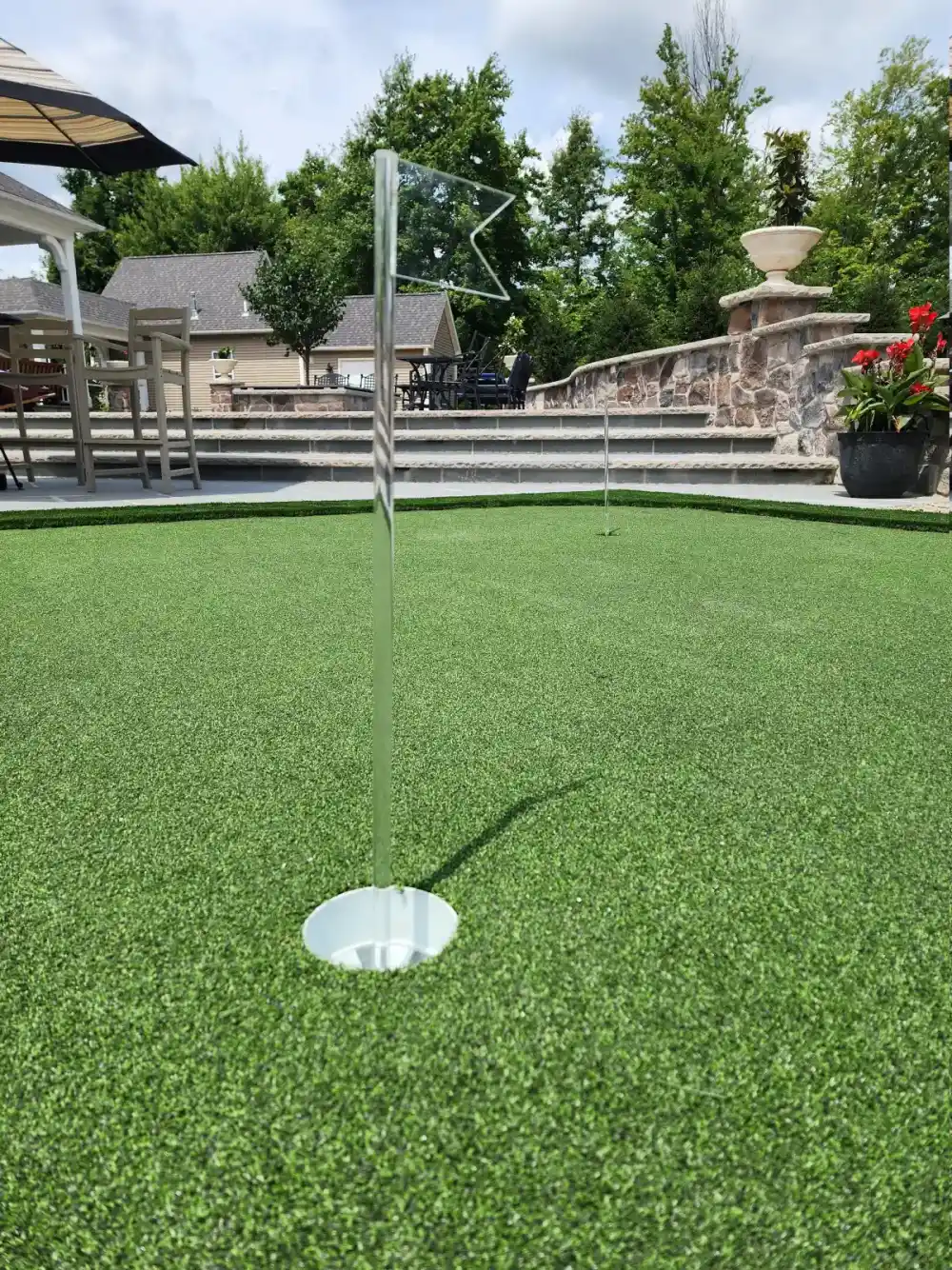 Putting green installation with fringe border by A.J. Kraig