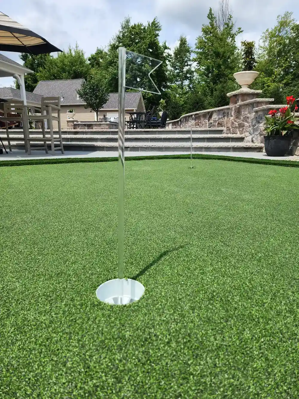 Custom putting green with multiple holes