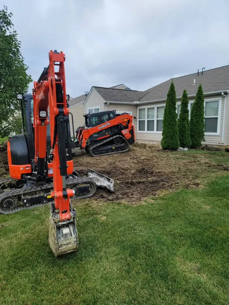 A.J. Kraig landscape crew installing a patio project