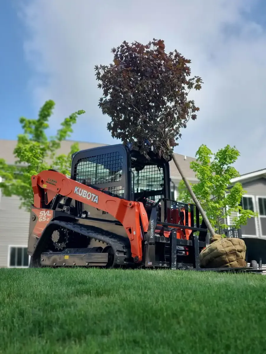 A.J. Kraig team working on a hardscape installation